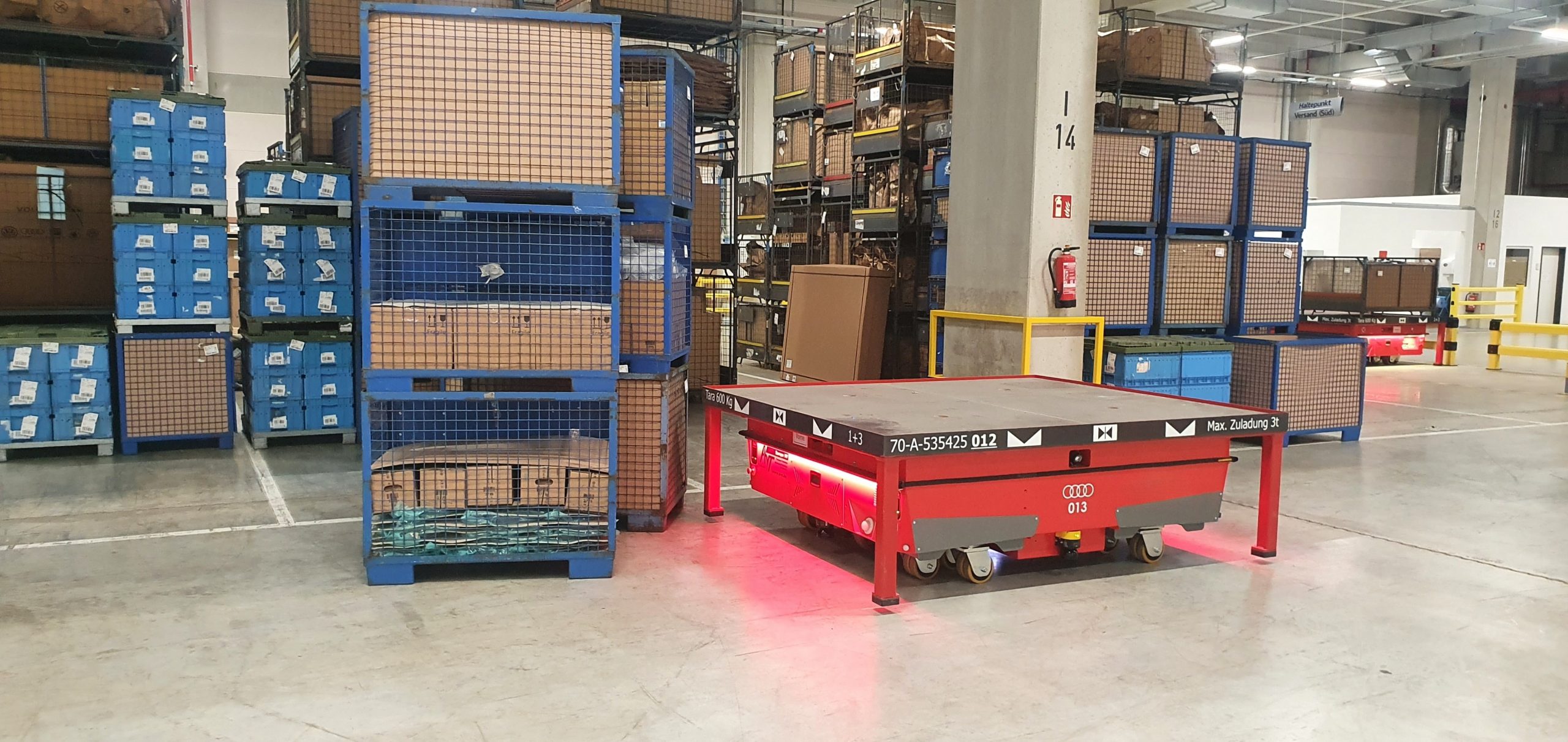 AGV with safety scanner in warehouse